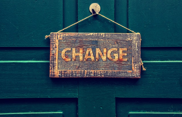 Change sign hanging on the door of a home